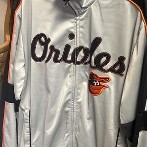 Orioles jacket throw back, cursive letters